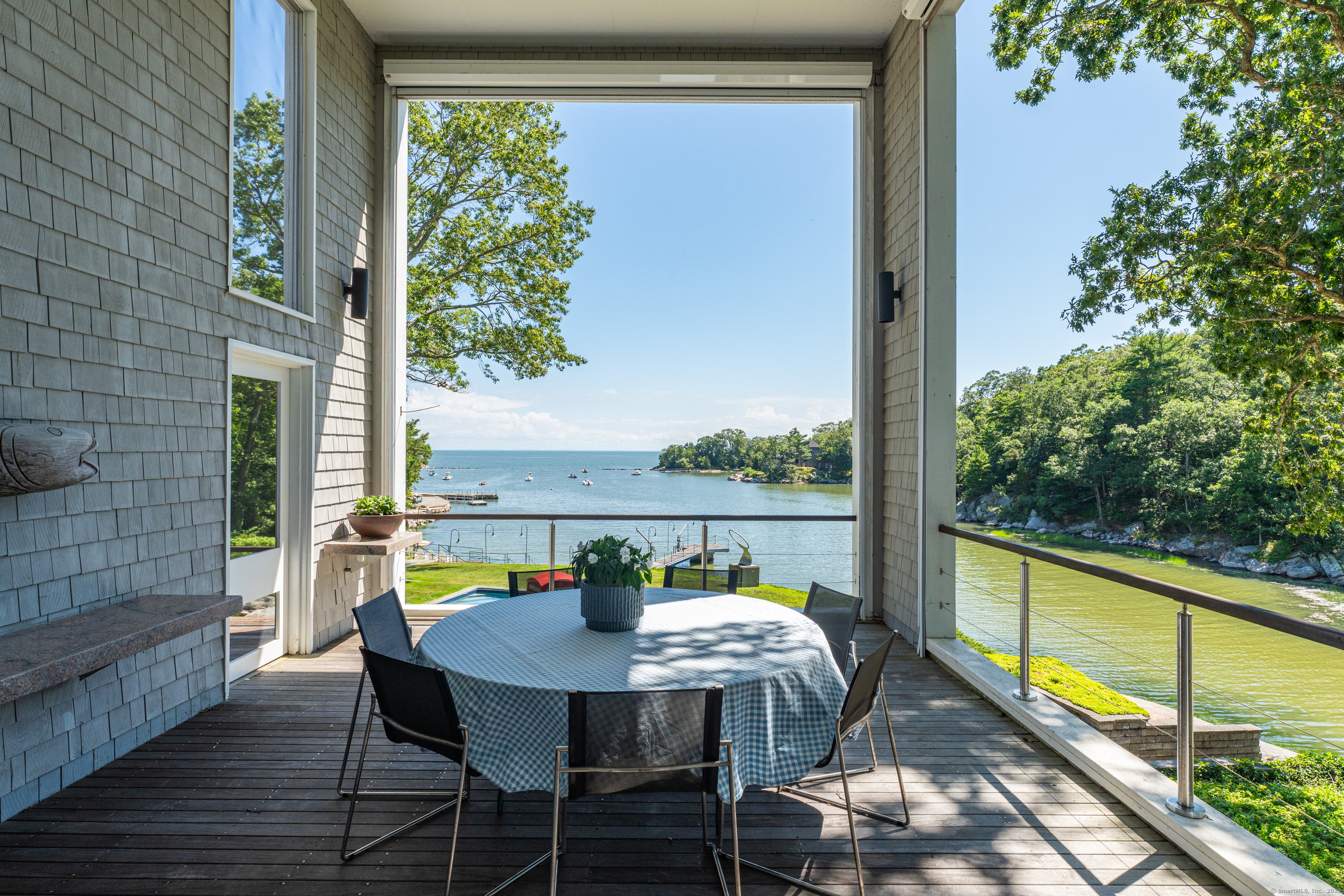 51 Andrews Road Guilford, CT 06437 - Photo 11 of 40 The "Eating Porch" - stunning views of the Harbor and beach.