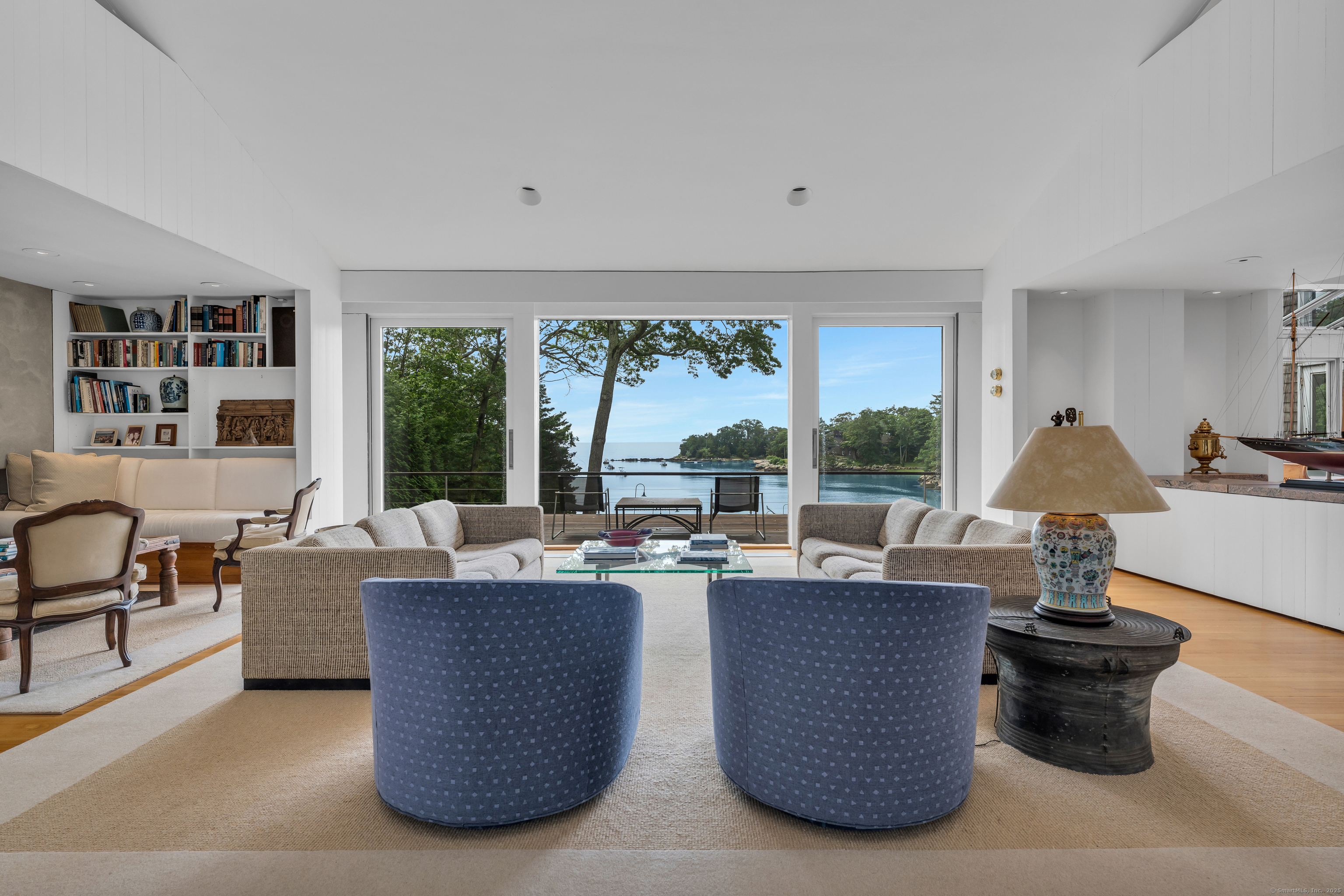 51 Andrews Road Guilford, CT 06437 - Photo 20 of 40 The "Million Dollar View" from the Living Room. On either side of large picture window are sliding doors to access the front deck.