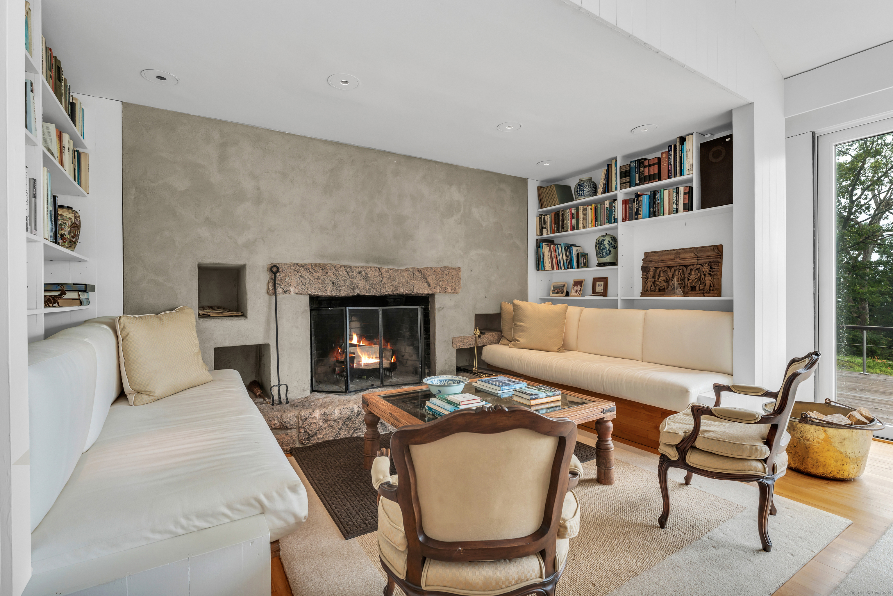 51 Andrews Road Guilford, CT 06437 - Photo 21 of 40 "The Nook" with Stony Creek granite accents around the fireplace.