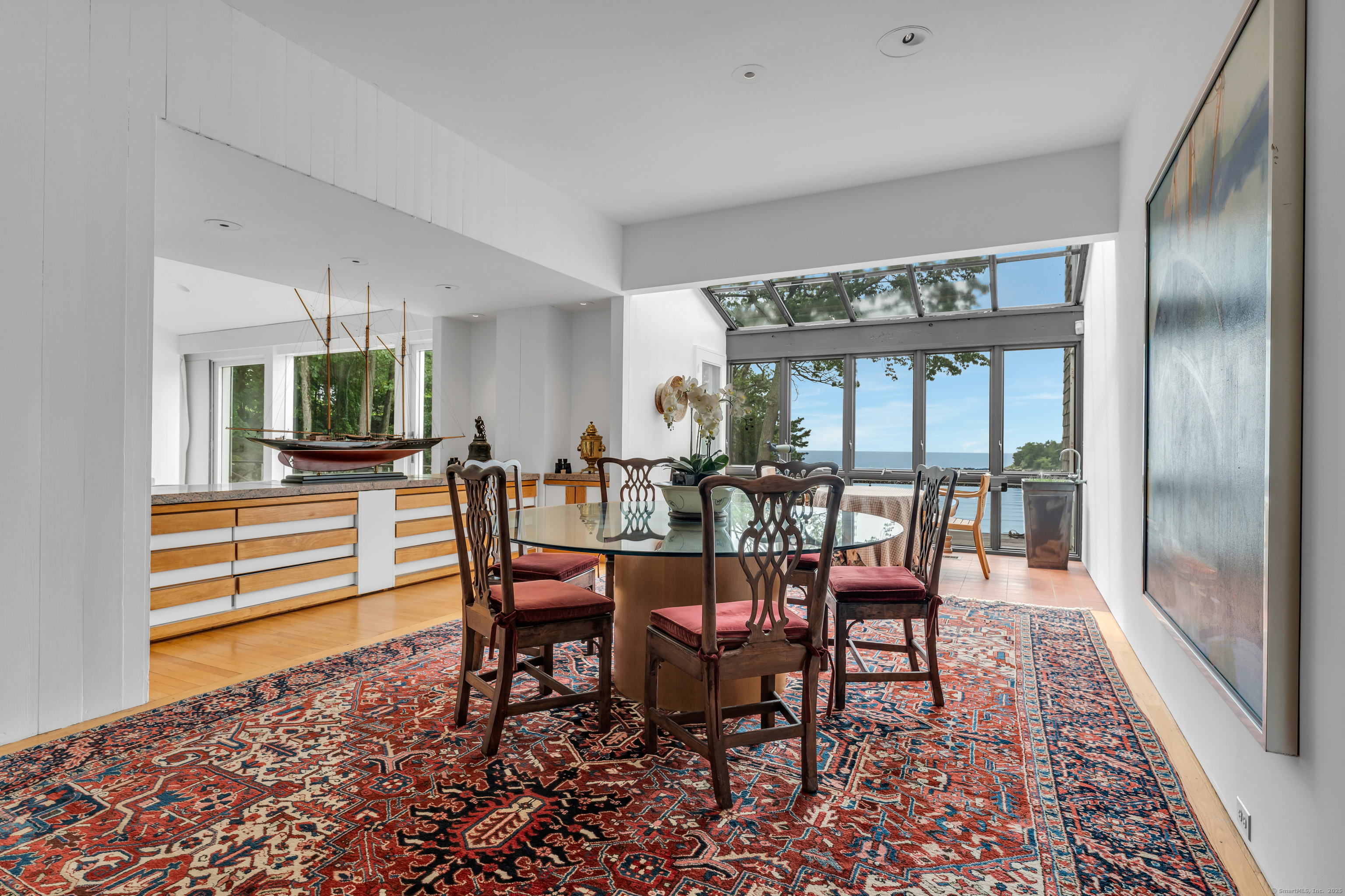 51 Andrews Road Guilford, CT 06437 - Photo 23 of 40 The Dining Room with a view into the Solarium.
