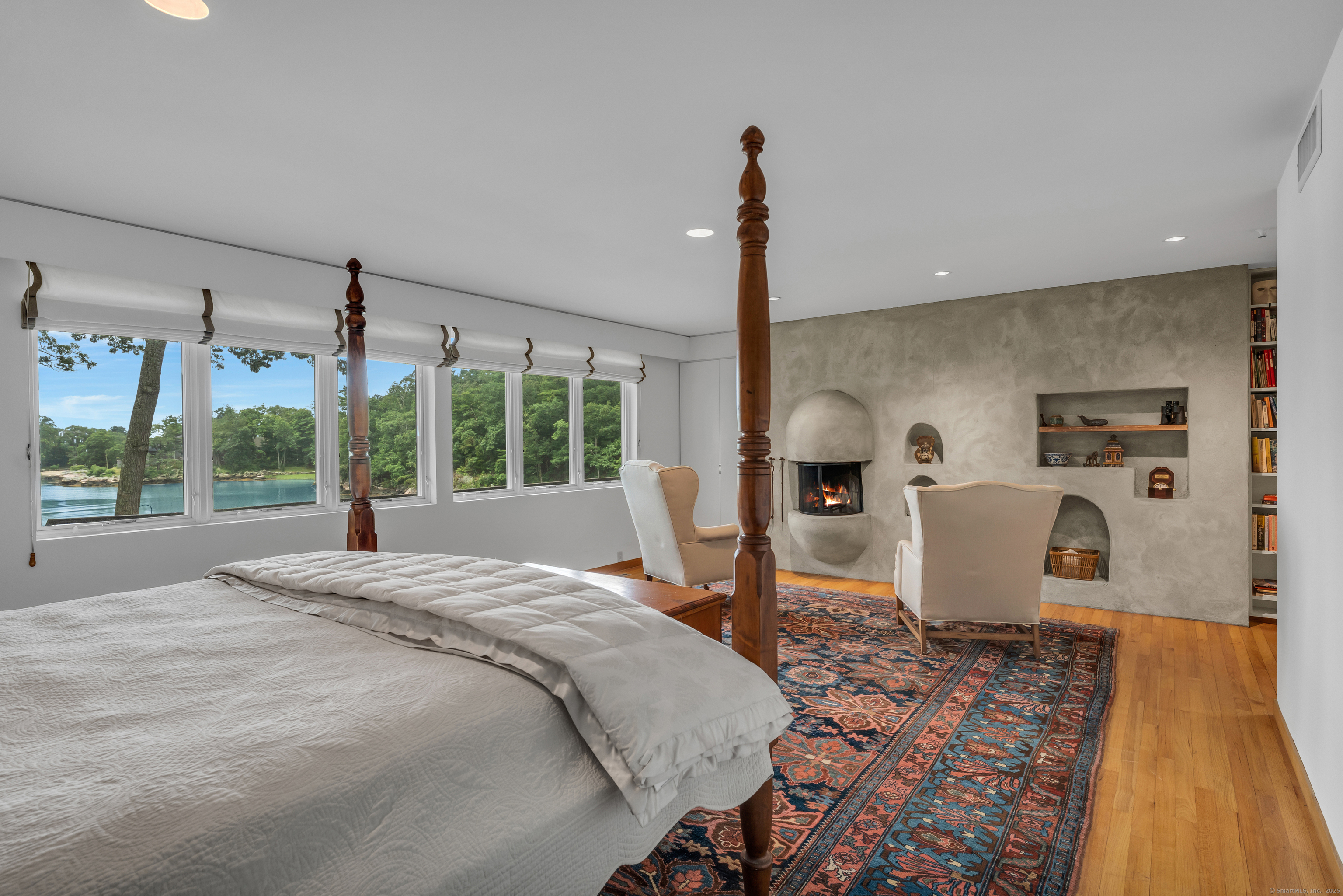 51 Andrews Road Guilford, CT 06437 - Photo 32 of 40 The cement wall (architect feature) hosts a fireplace.