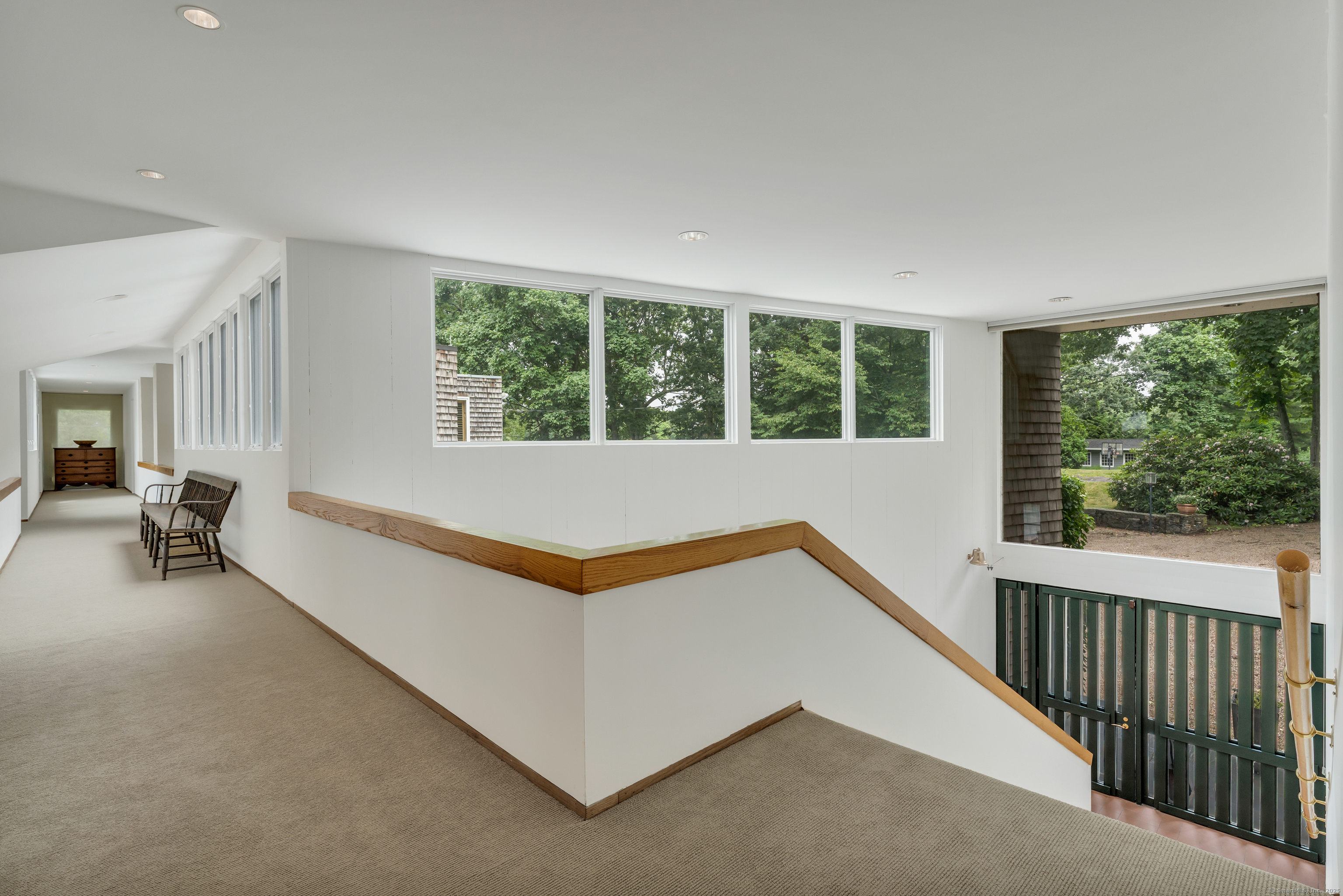51 Andrews Road Guilford, CT 06437 - Photo 37 of 40 The upstairs hallway that runs the length of the home.