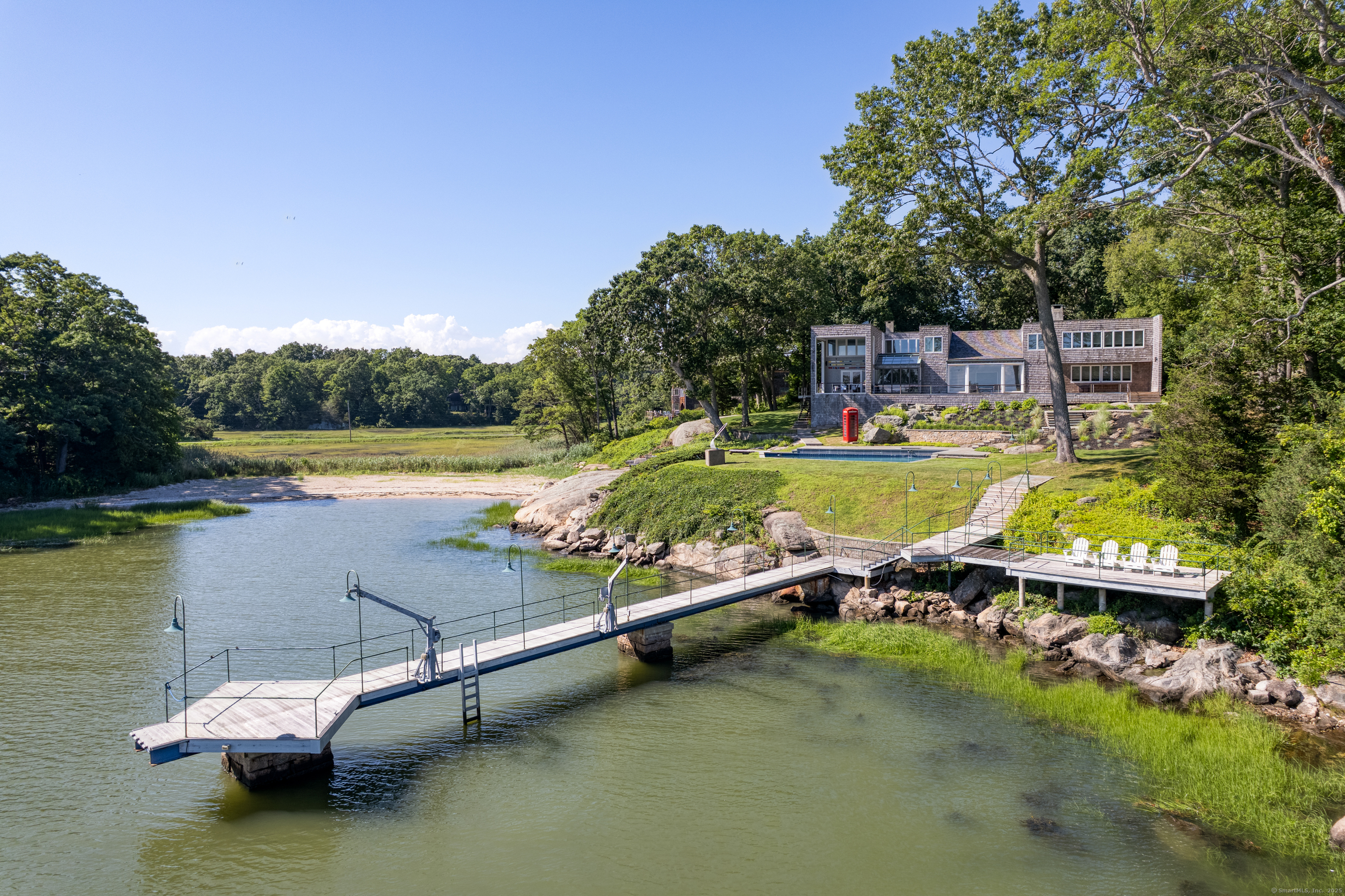51 Andrews Road Guilford, CT 06437 - Photo 8 of 40 There is a ramp at the end of the pier that leads to two floating docks that were not installed this year.