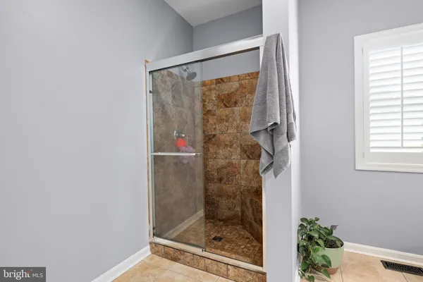 a bathroom with a toilet and a sink