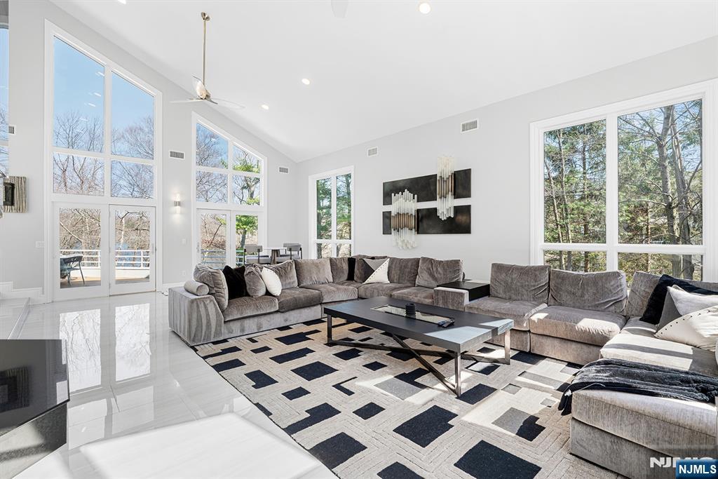 817 West Shore Drive Butler, NJ 07405 - Photo 18 of 50 a living room with furniture wooden floor and a large window