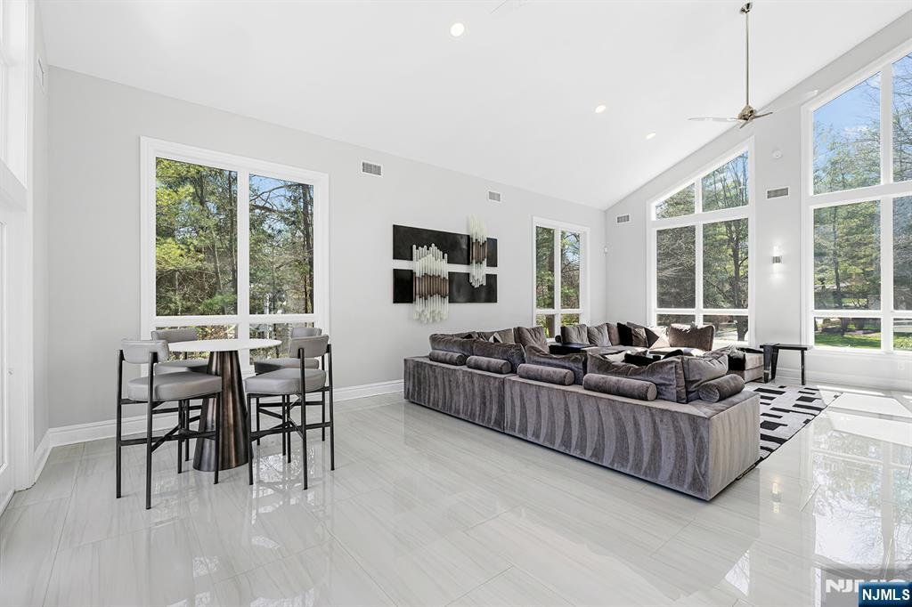 817 West Shore Drive Butler, NJ 07405 - Photo 19 of 50 a living room with furniture and a large window