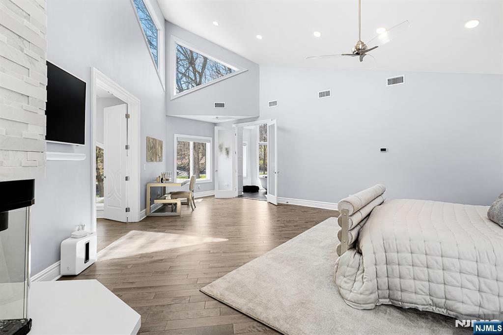817 West Shore Drive Butler, NJ 07405 - Photo 23 of 50 a living room with furniture and a flat screen tv