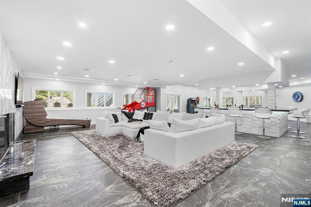 817 West Shore Drive Butler, NJ 07405 - Photo 36 of 50 a living room with furniture and a table