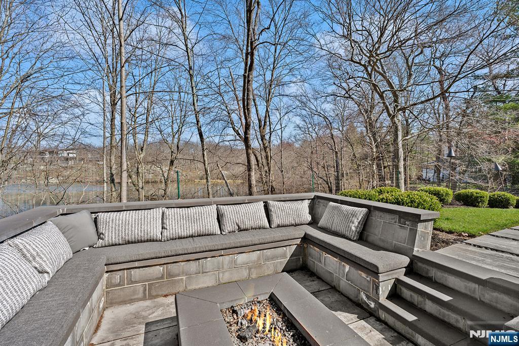 817 West Shore Drive Butler, NJ 07405 - Photo 43 of 50 a view of a bench in a back yard