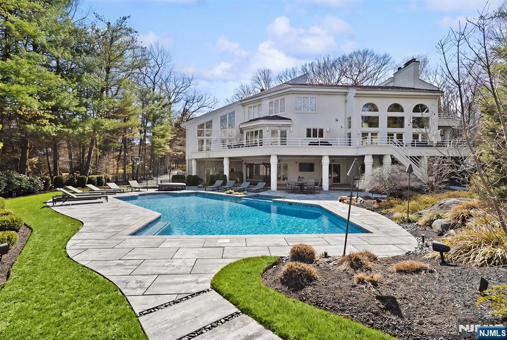 817 West Shore Drive Butler, NJ 07405 - Photo 46 of 50 a front view of a house with swimming pool