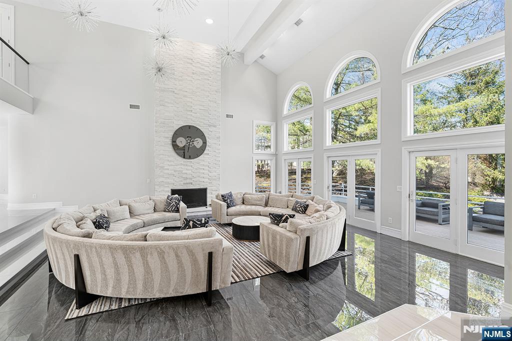 817 West Shore Drive Butler, NJ 07405 - Photo 6 of 50 a living room with furniture and a large window
