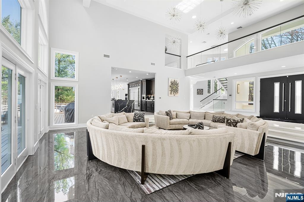 817 West Shore Drive Butler, NJ 07405 - Photo 7 of 50 a dining room with furniture a chandelier and wooden floor