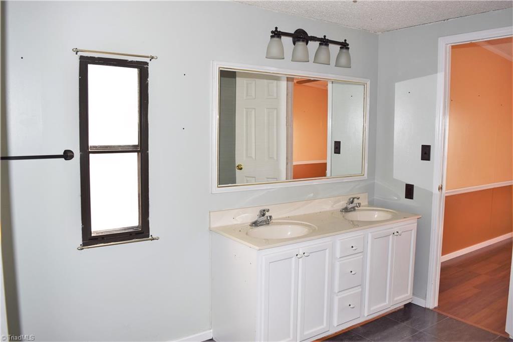 739 Simpson Road Stokesdale, NC 27357 - Photo 14 of 28 Master bathroom