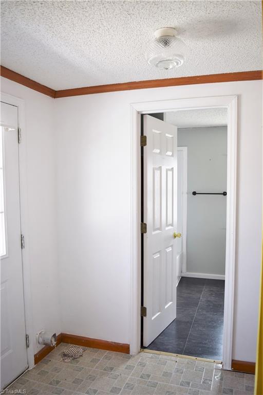 739 Simpson Road Stokesdale, NC 27357 - Photo 22 of 28 Laundry room with door to master bathroom