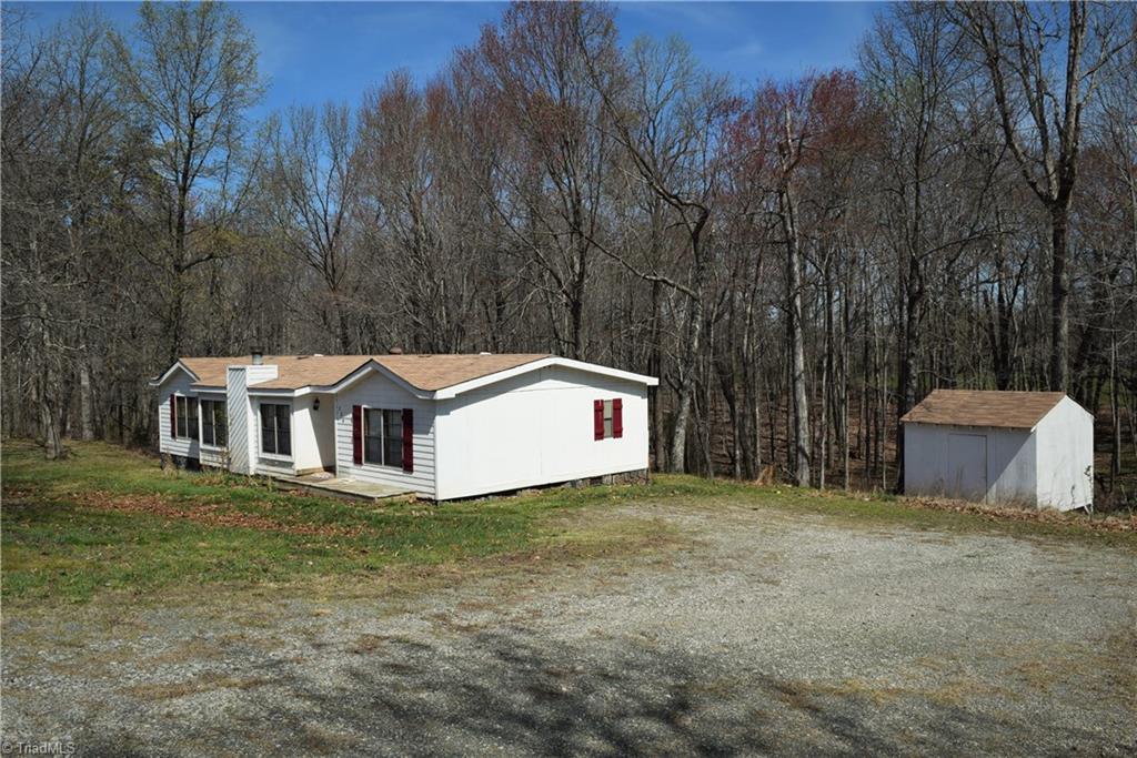 739 Simpson Road Stokesdale, NC 27357 - Photo 23 of 28 Driveway and parking area
