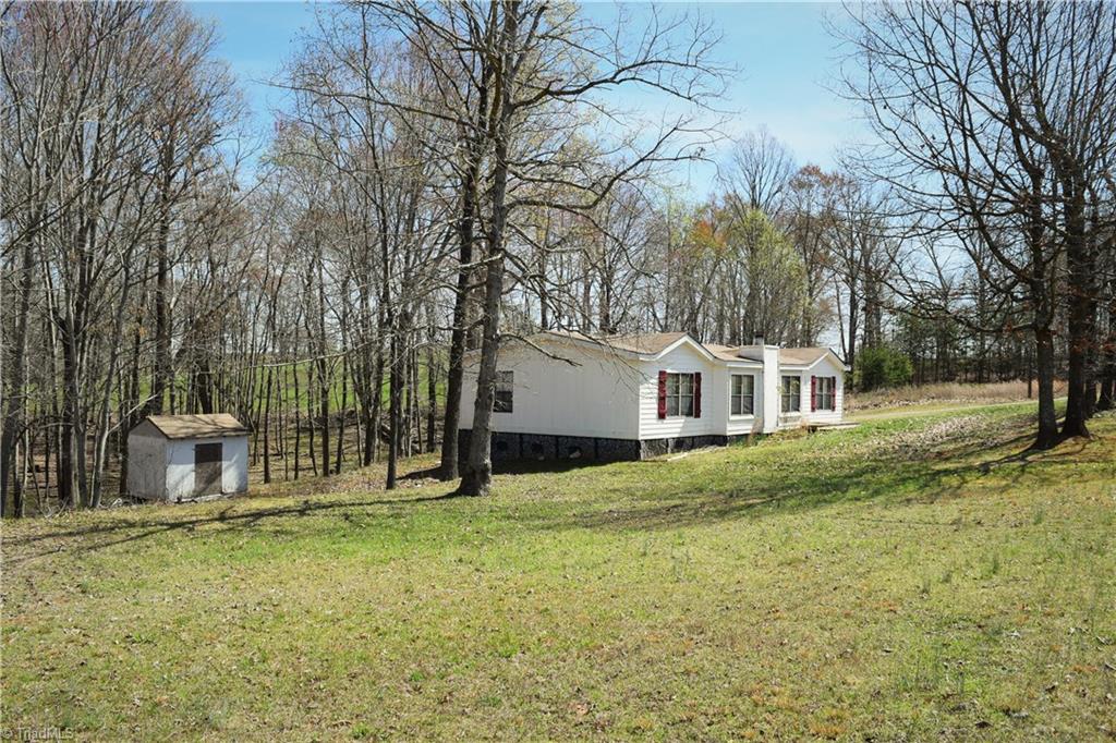 739 Simpson Road Stokesdale, NC 27357 - Photo 26 of 28 Front and side yard