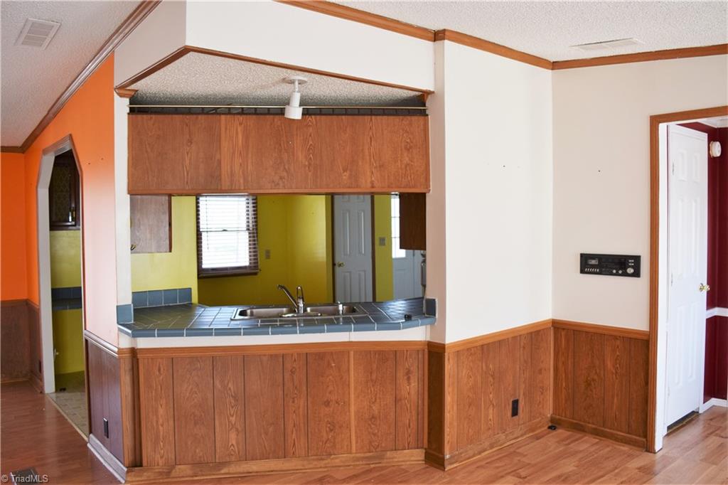 739 Simpson Road Stokesdale, NC 27357 - Photo 5 of 28 View of kitchen from living room