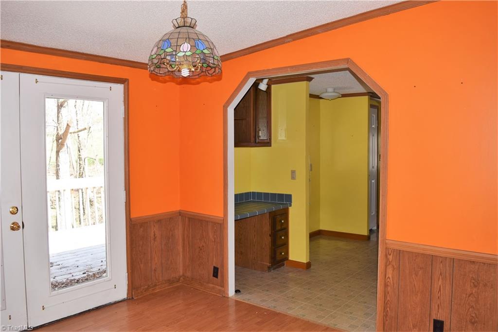 739 Simpson Road Stokesdale, NC 27357 - Photo 10 of 28 Dining room looking into kitchen