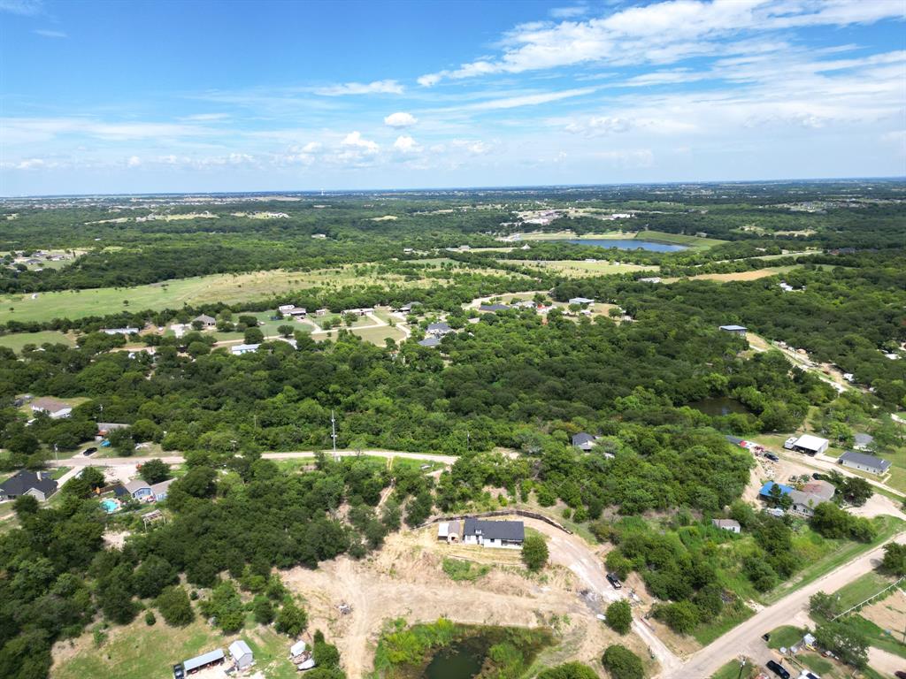 441 Mesa Road Waxahachie, TX 75167 - Photo 5 of 11 Bird's eye view of a nearby body of water and a forest