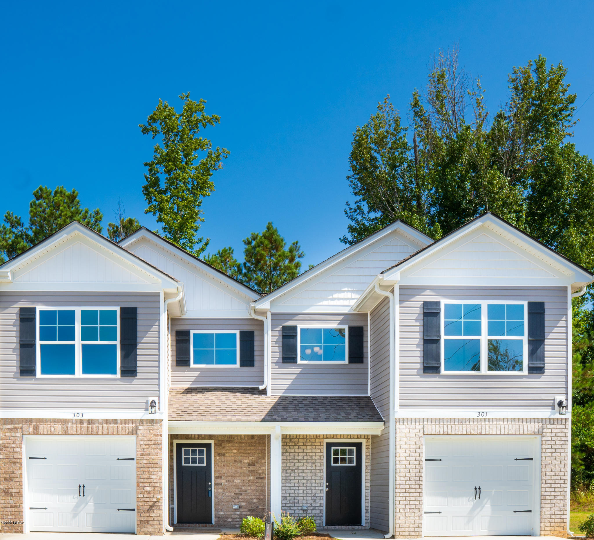 303 Pond View Road Macon, GA 31206 - Photo 1 of 33 front view of a house with a yard
