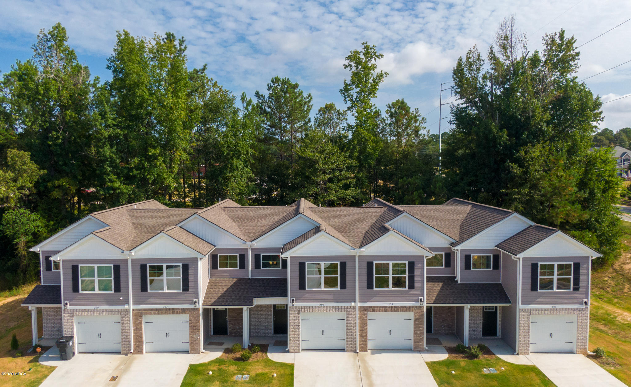 303 Pond View Road Macon, GA 31206 - Photo 26 of 33 a front view of a residential houses with yard and green space