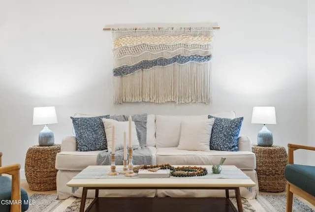 a living room with furniture and a couch