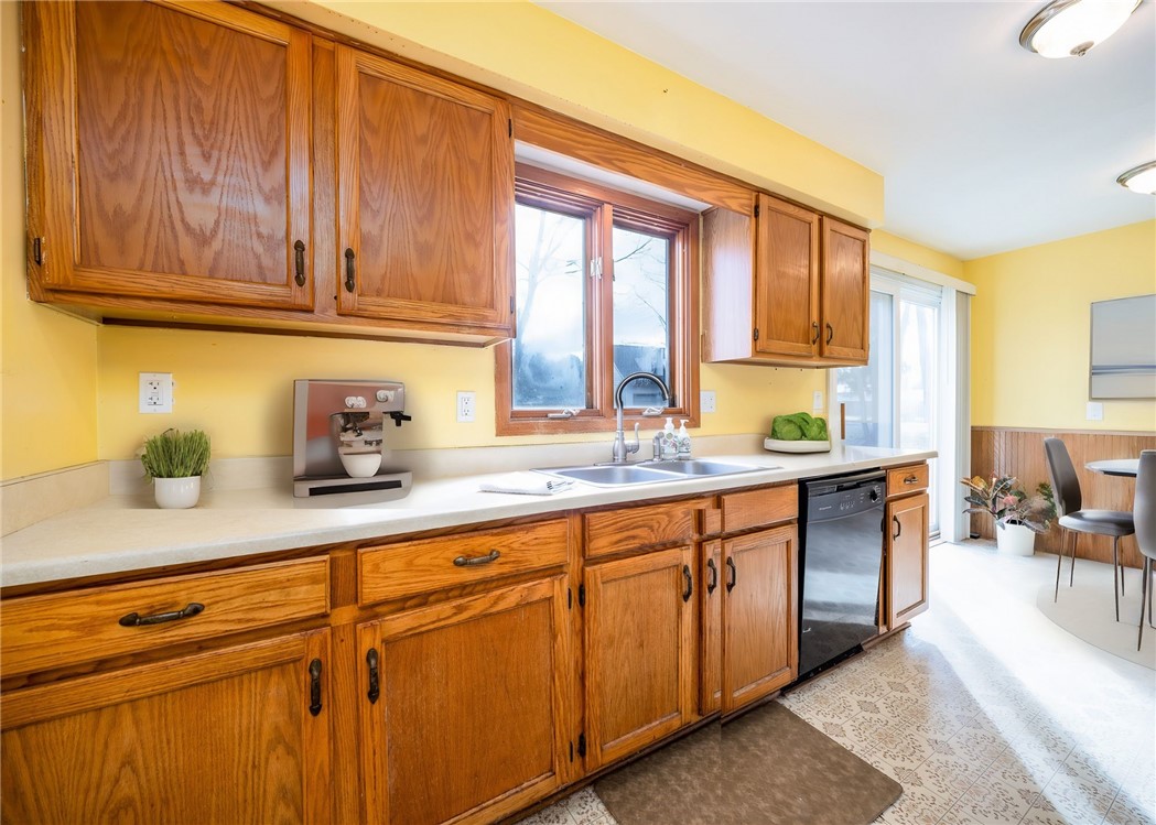 946 Bay Road Webster, NY 14580 - Photo 16 of 43 Virtually staged kitchen / dining area