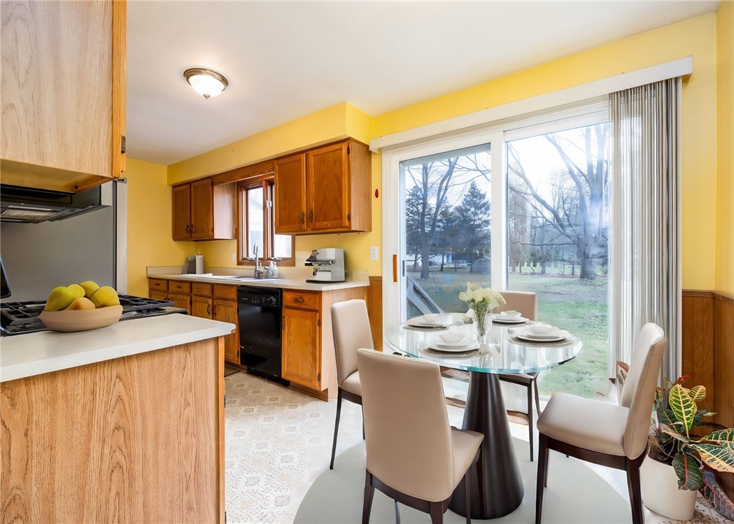 946 Bay Road Webster, NY 14580 - Photo 18 of 43 Virtually staged dining area / kitchen