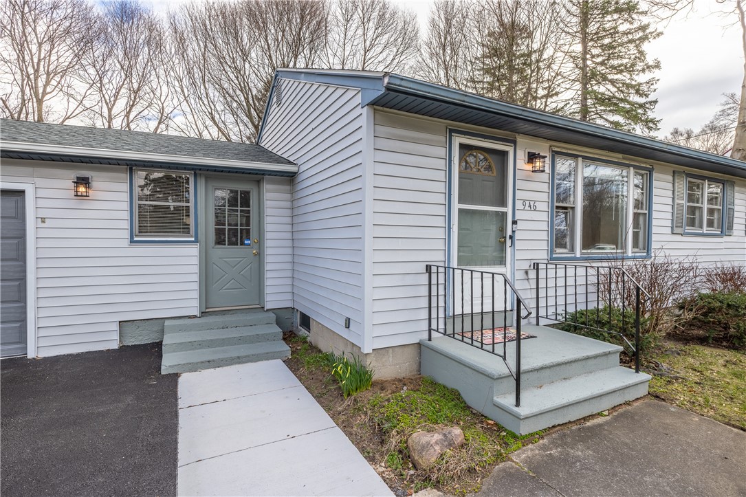 946 Bay Road Webster, NY 14580 - Photo 32 of 43 Breezeway entrance with new sidewalk and steps