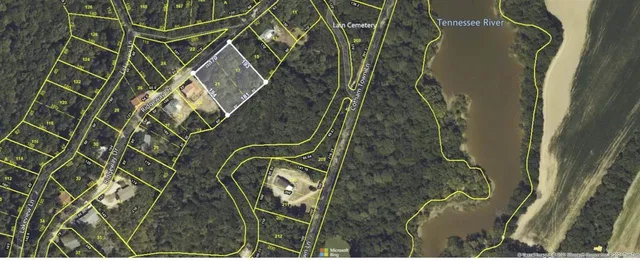 a view of a field with an ocean view