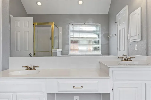 a bathroom with a bathtub and a sink