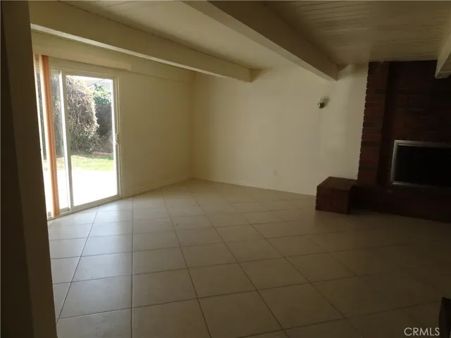 a living room with a fireplace