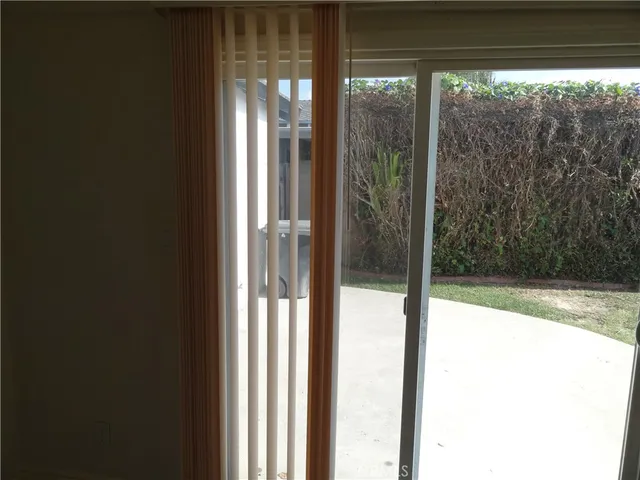 a bath tub sitting next to a white toilet and sink