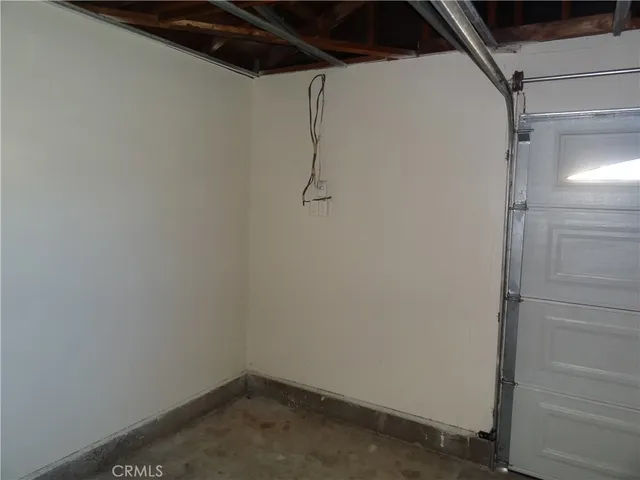 a view of a window in an empty room