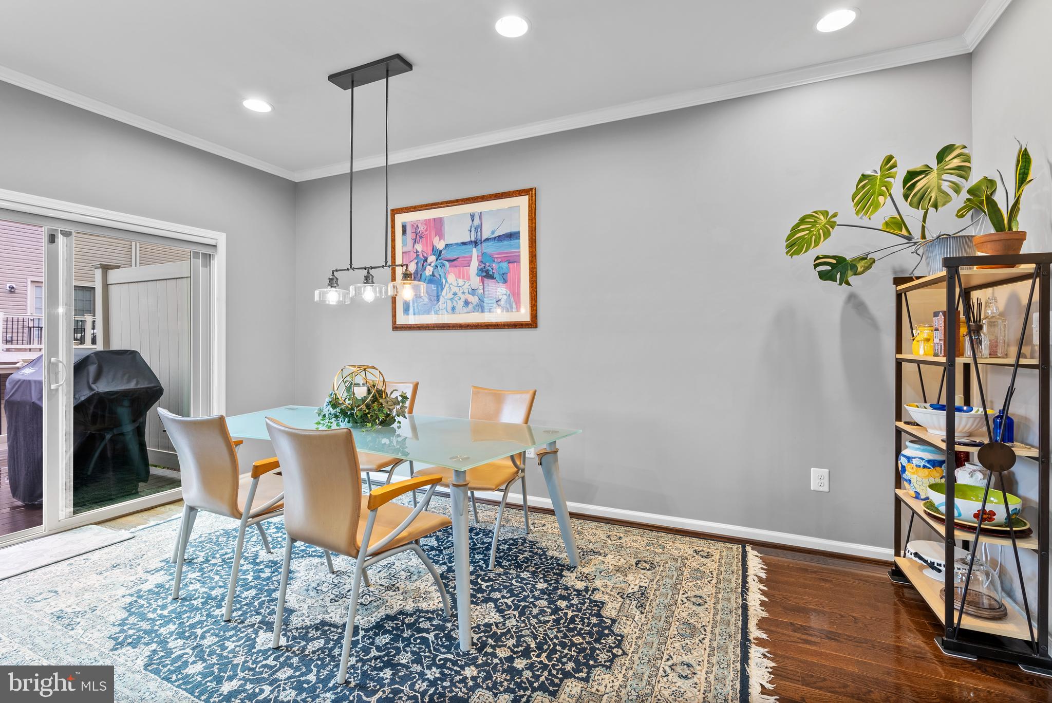 834 Oldham Street Baltimore, MD 21224 - Photo 18 of 55 a dining room filled with furniture and a potted plant
