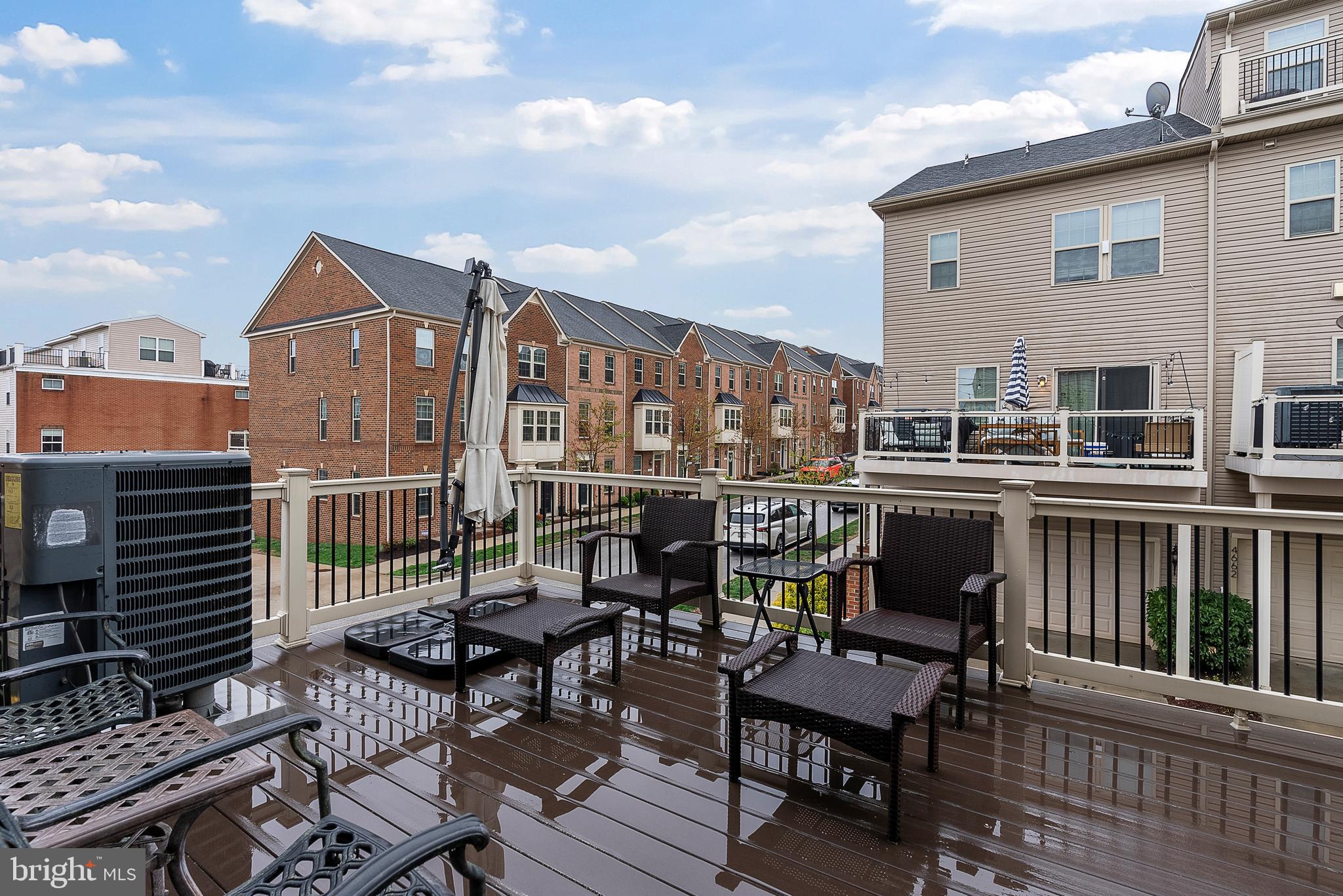 834 Oldham Street Baltimore, MD 21224 - Photo 19 of 55 a view of a chairs and table on the terrace