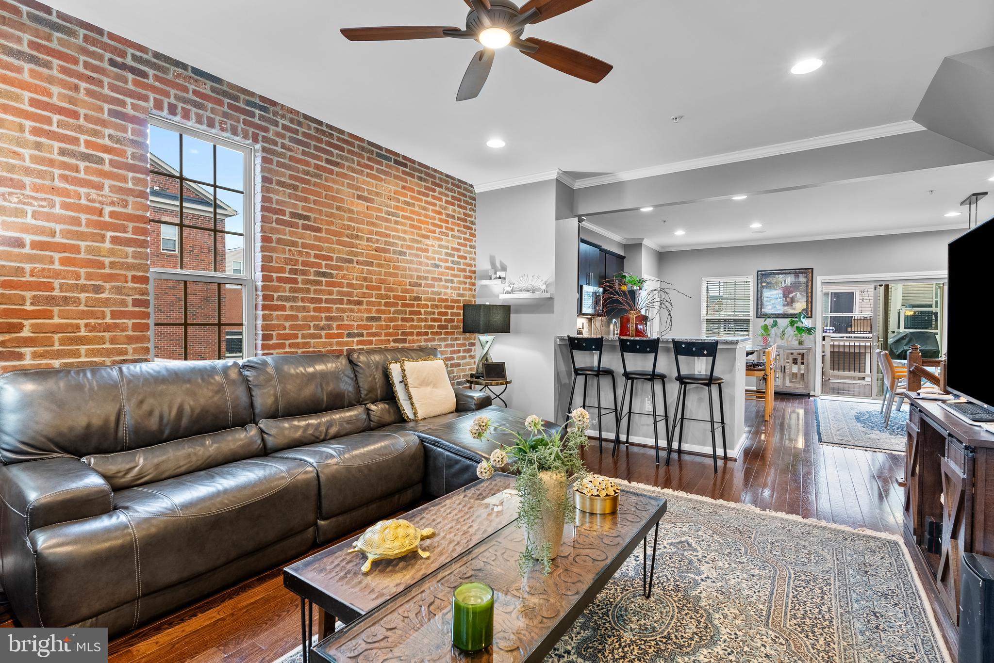 834 Oldham Street Baltimore, MD 21224 - Photo 24 of 55 a living room with furniture and a flat screen tv