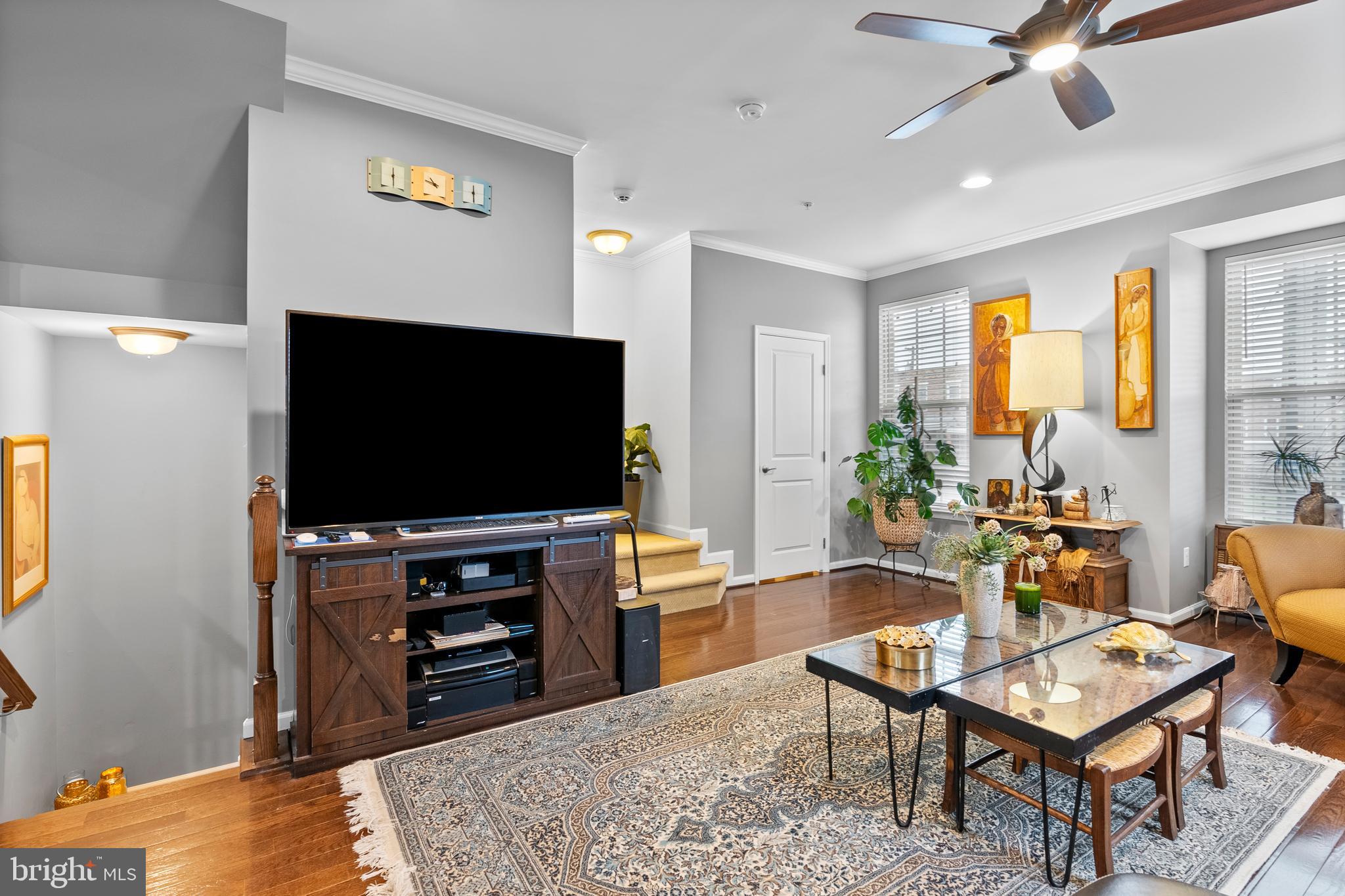 834 Oldham Street Baltimore, MD 21224 - Photo 25 of 55 a living room with furniture and a flat screen tv