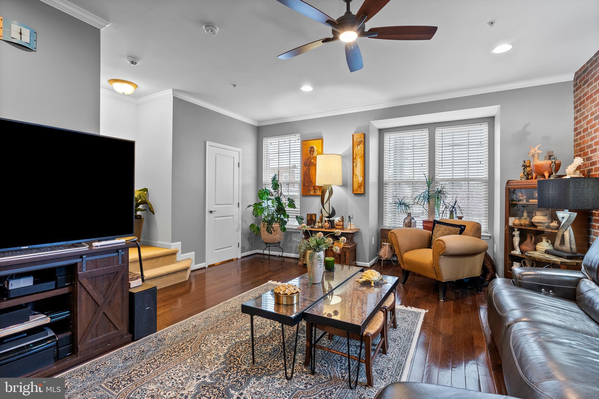 834 Oldham Street Baltimore, MD 21224 - Photo 26 of 55 a living room with furniture and a flat screen tv