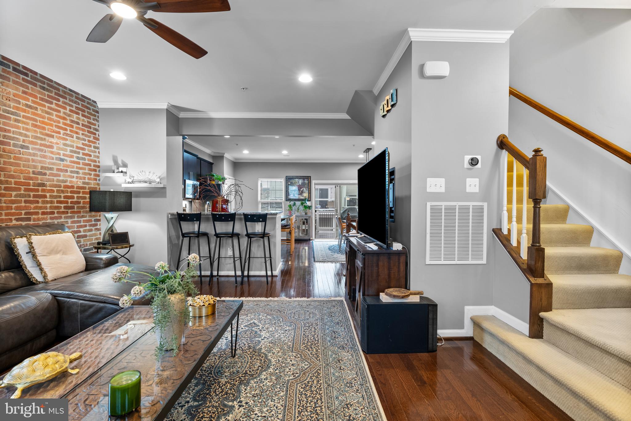 834 Oldham Street Baltimore, MD 21224 - Photo 28 of 55 a living room with furniture and a wooden floor