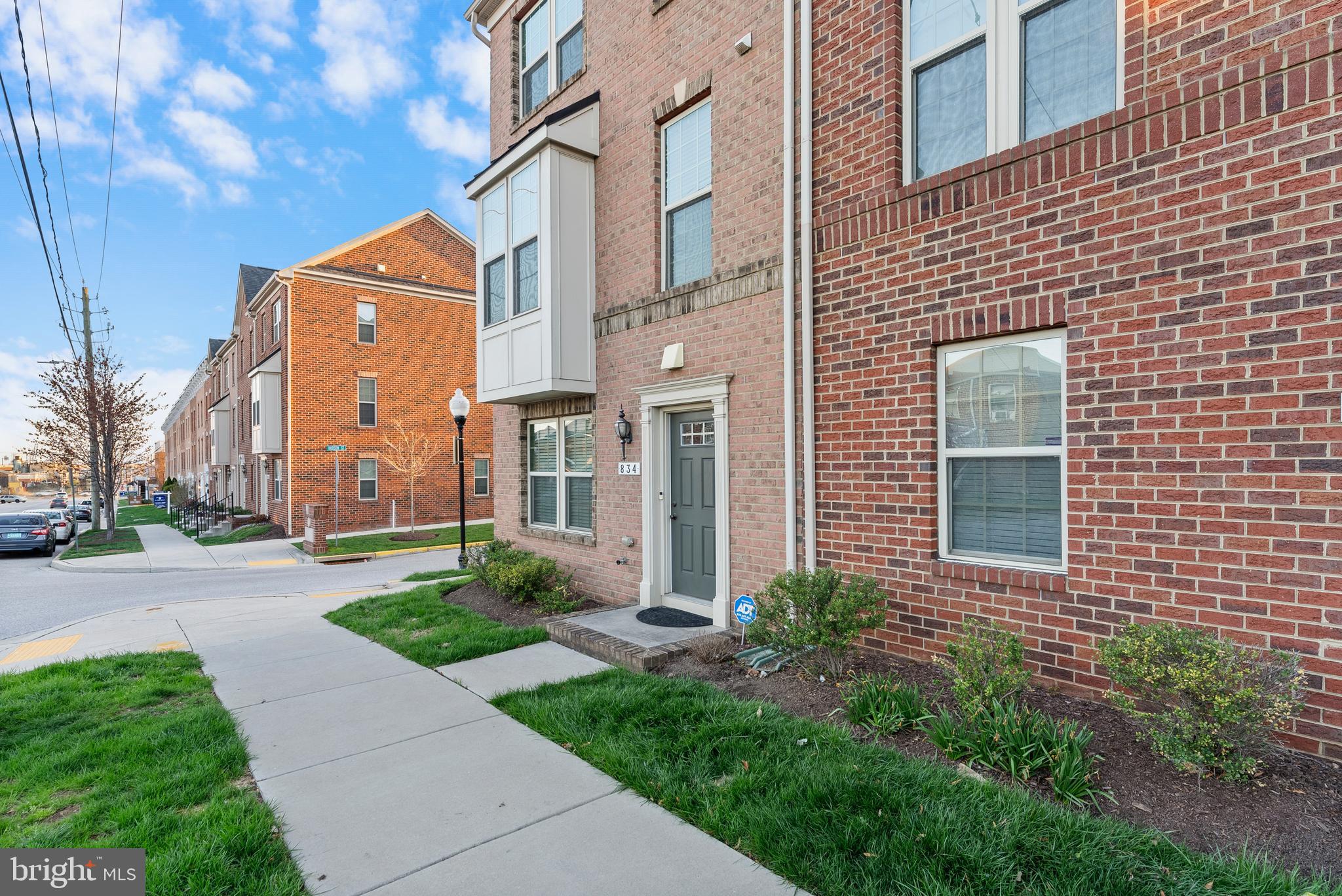 834 Oldham Street Baltimore, MD 21224 - Photo 3 of 55 a backyard of a house with a garden and plants