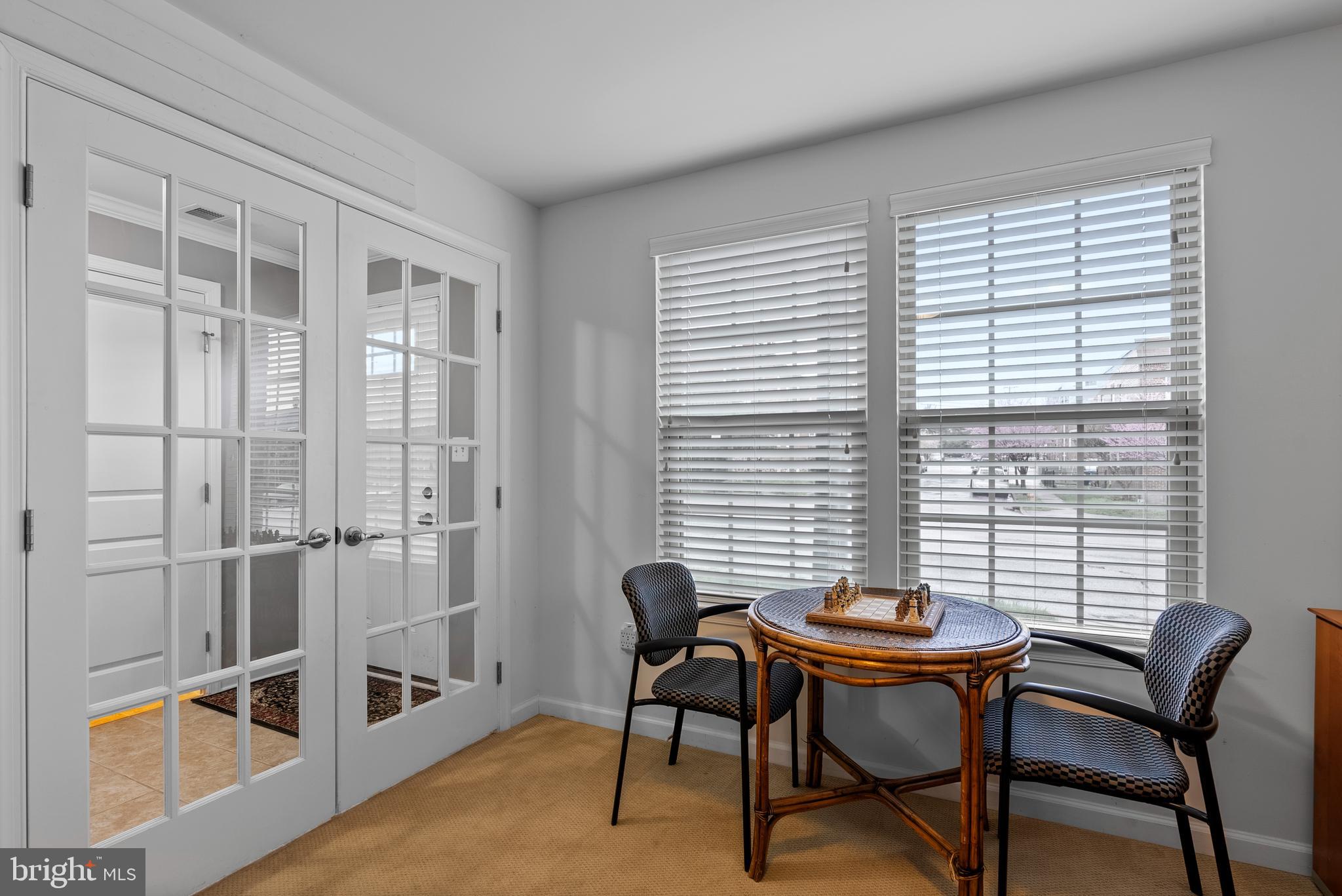 834 Oldham Street Baltimore, MD 21224 - Photo 8 of 55 a view of a dining room with furniture and windows