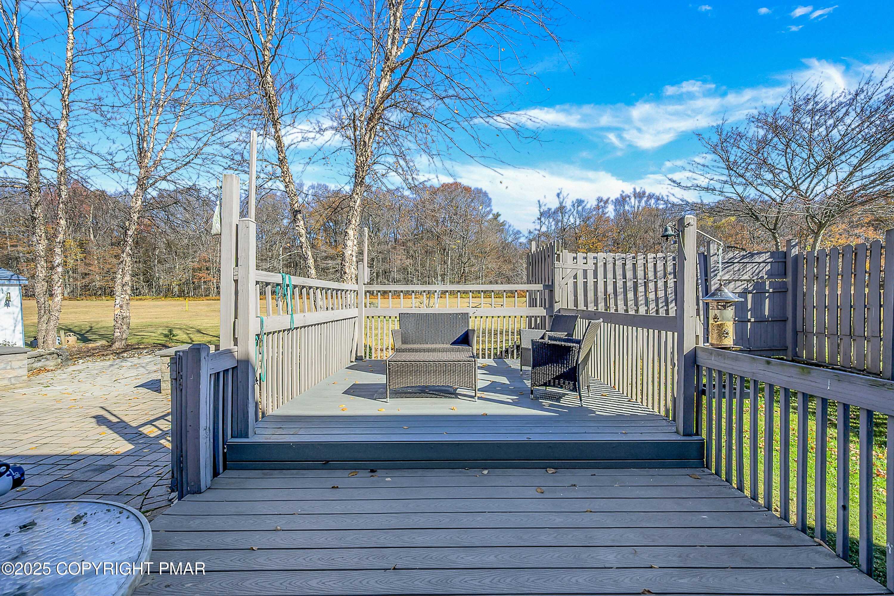 1451 Long Pond Road Long Pond, PA 18334 - Photo 31 of 82 a view of a deck with a floor to ceiling window wooden floor and fence