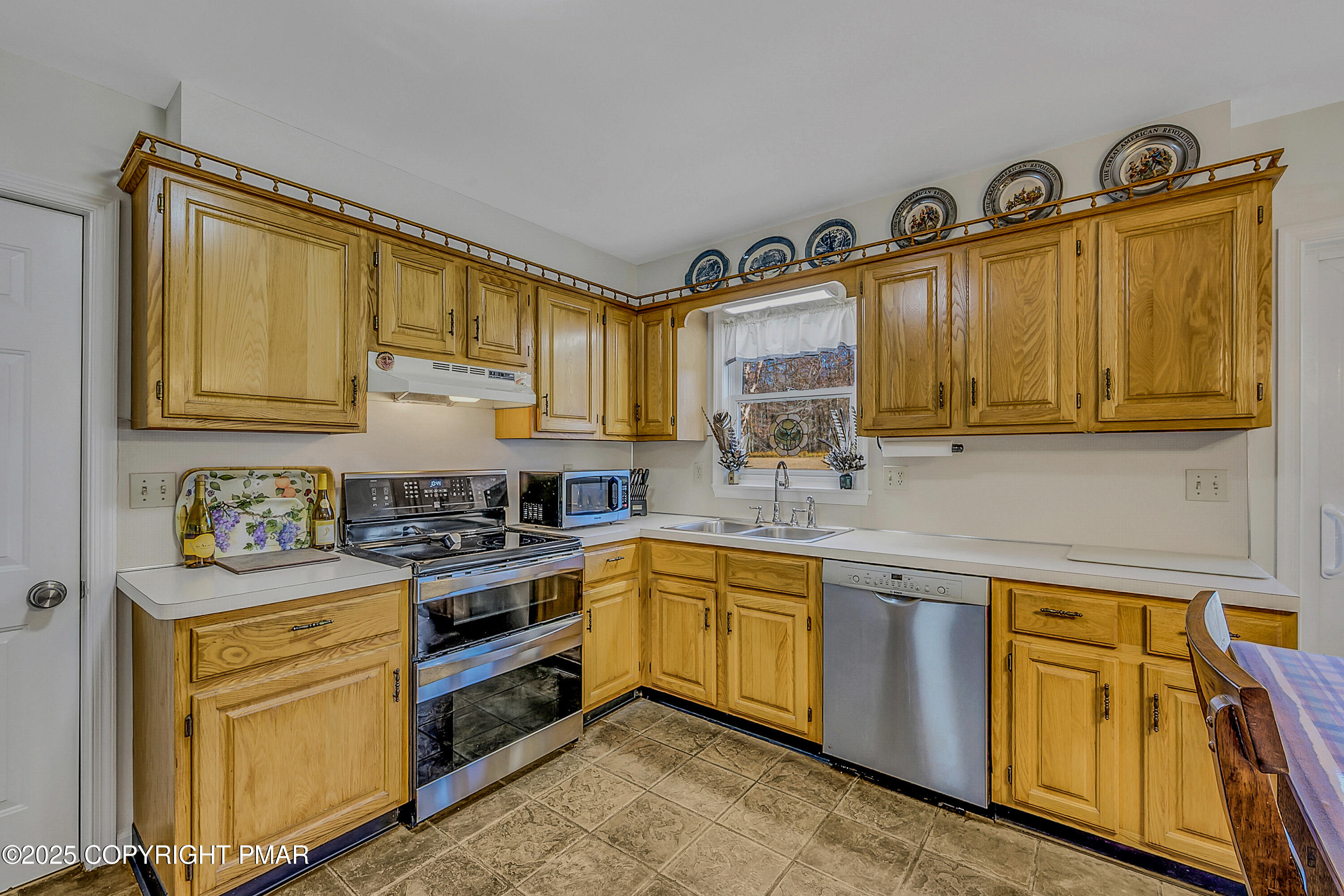 1451 Long Pond Road Long Pond, PA 18334 - Photo 42 of 82 a kitchen with stainless steel appliances granite countertop a sink and cabinets