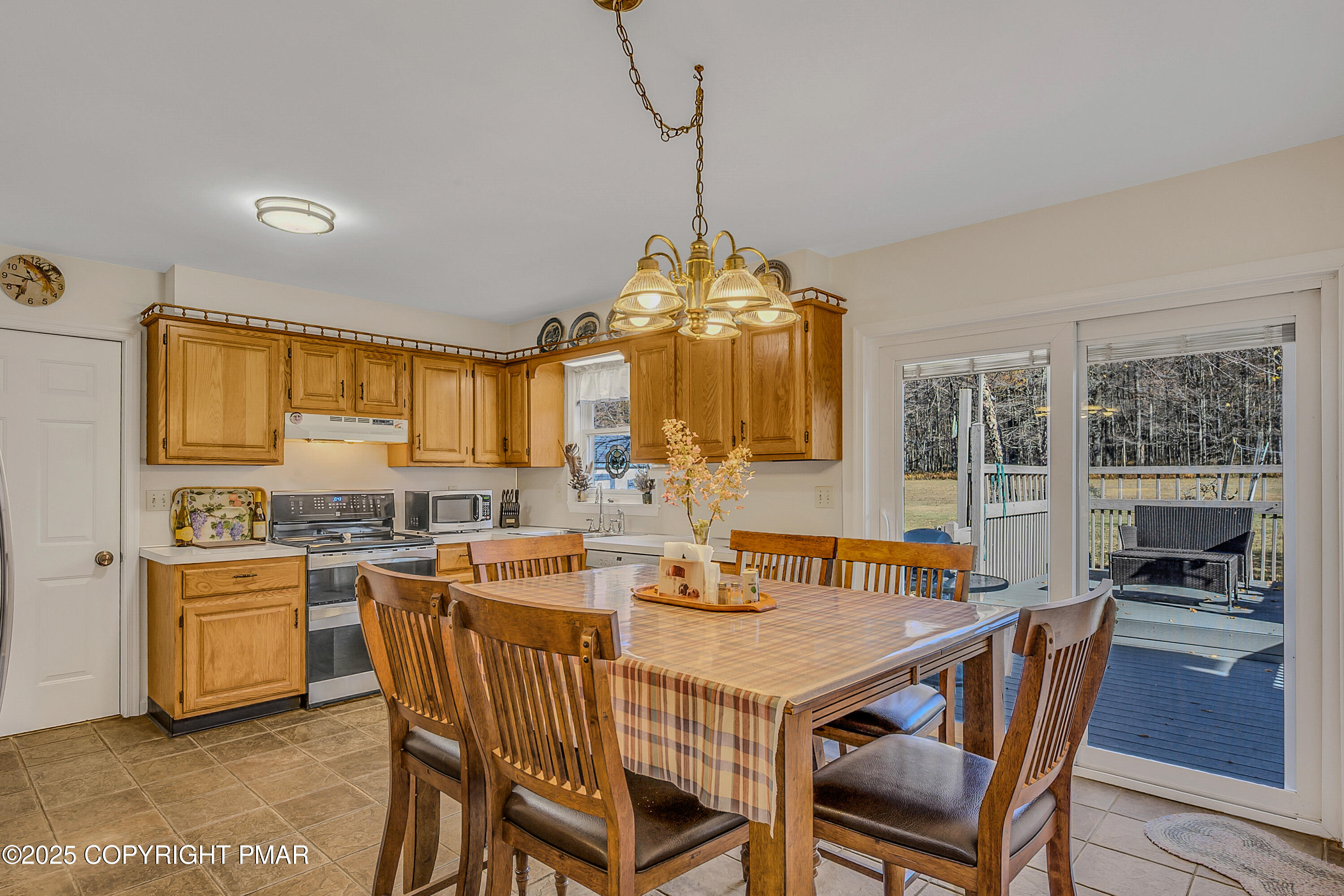 1451 Long Pond Road Long Pond, PA 18334 - Photo 47 of 82 a view of a dining room with furniture and wooden floor