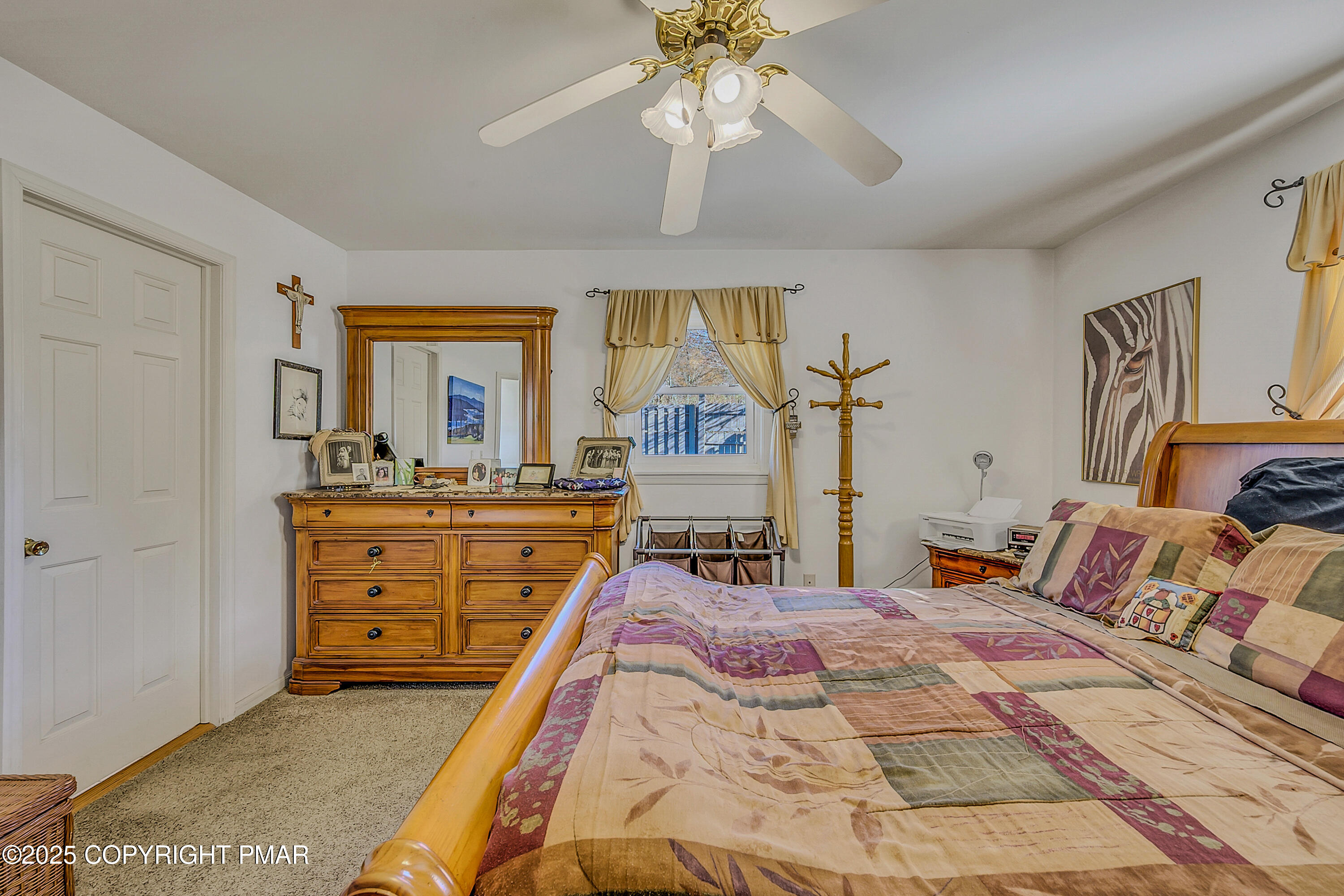 1451 Long Pond Road Long Pond, PA 18334 - Photo 49 of 82 a bedroom with a bed and a chandelier
