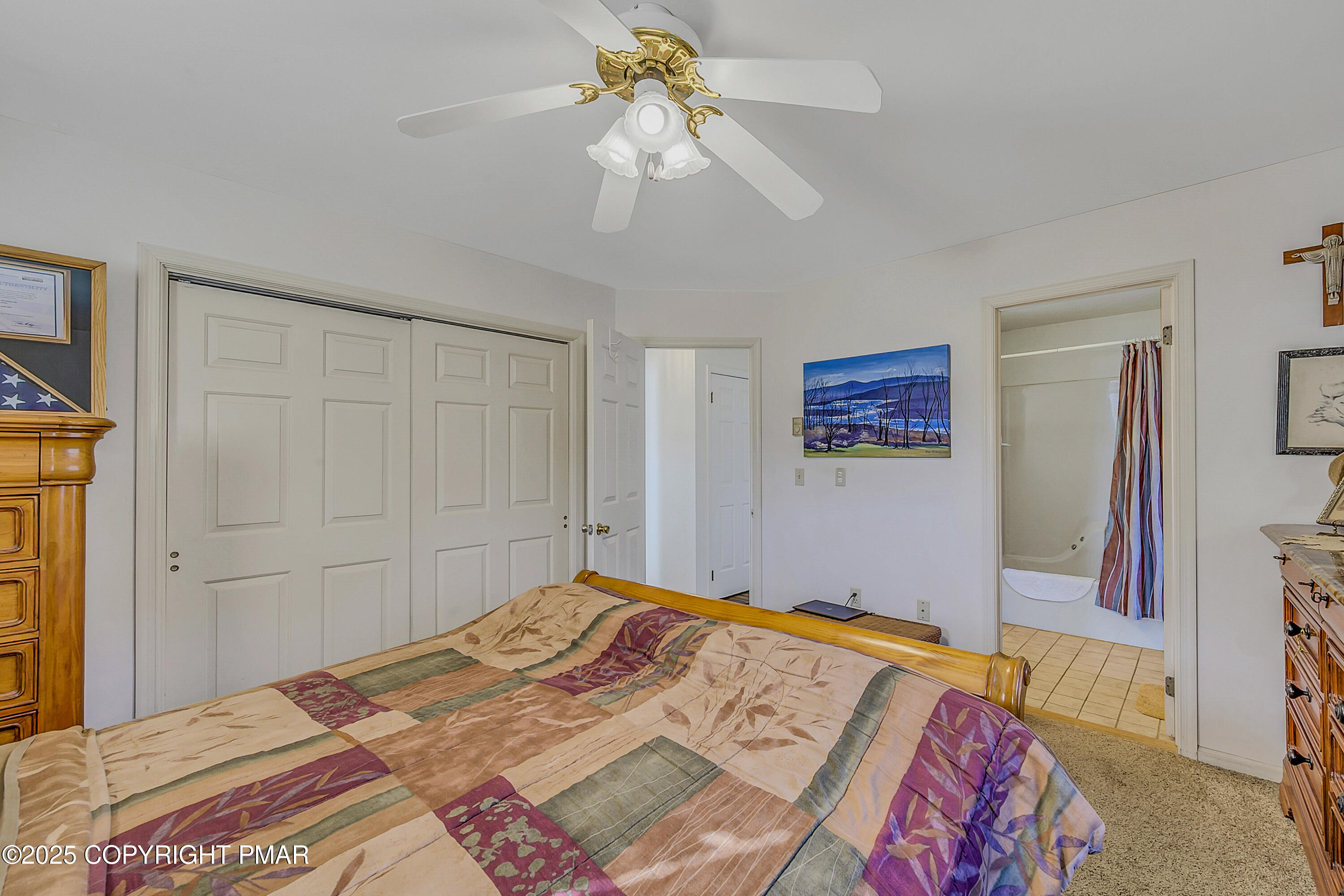 1451 Long Pond Road Long Pond, PA 18334 - Photo 50 of 82 a bedroom with a bed and a chandelier