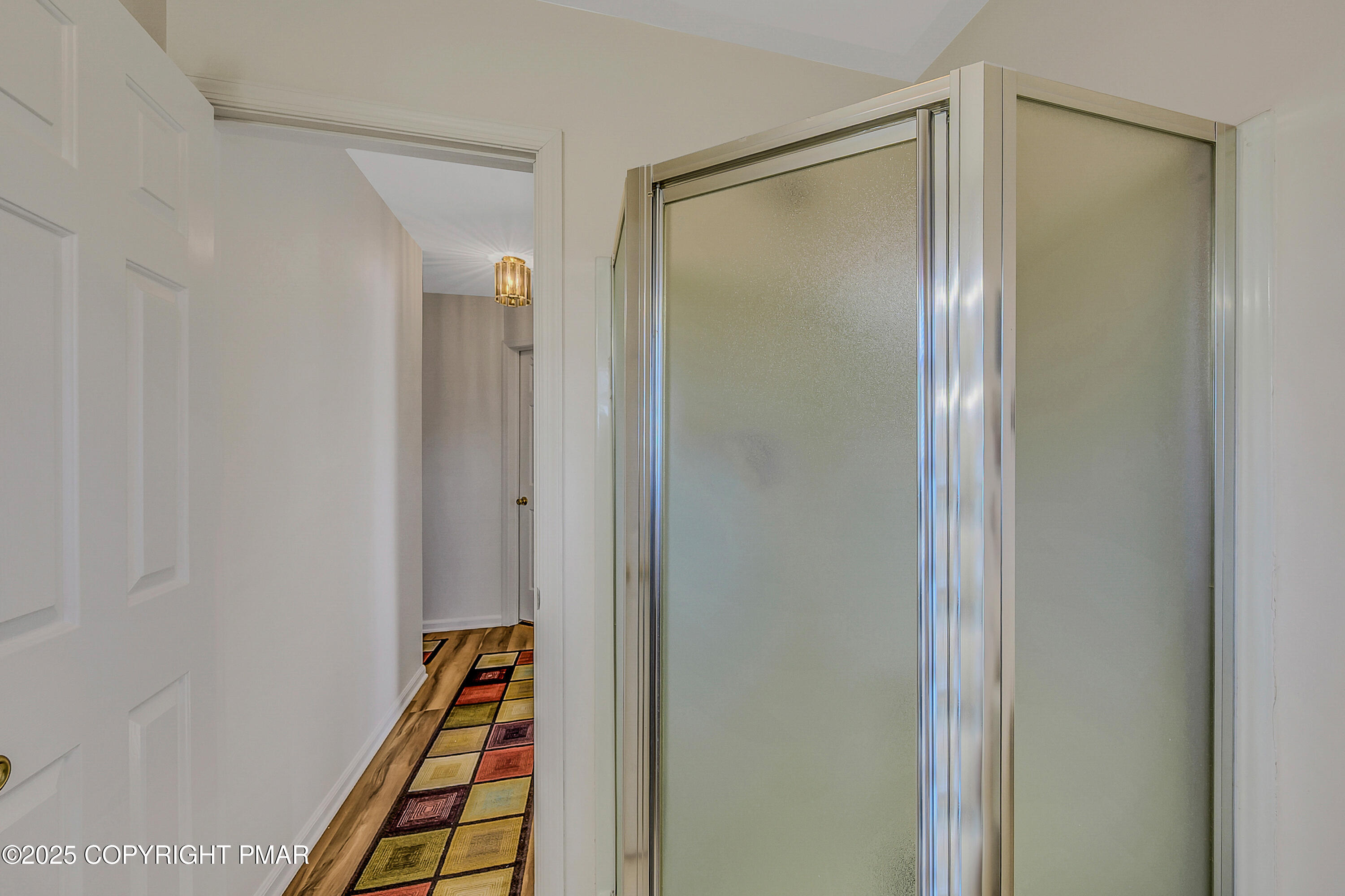 1451 Long Pond Road Long Pond, PA 18334 - Photo 56 of 82 a bathroom with a glass shower door and a mirror
