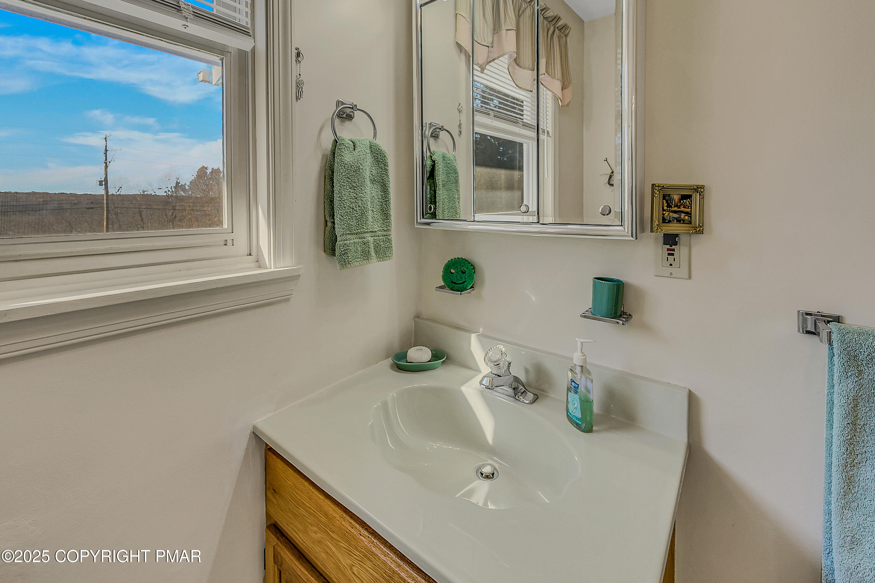 1451 Long Pond Road Long Pond, PA 18334 - Photo 57 of 82 a bathroom with a sink and a mirror