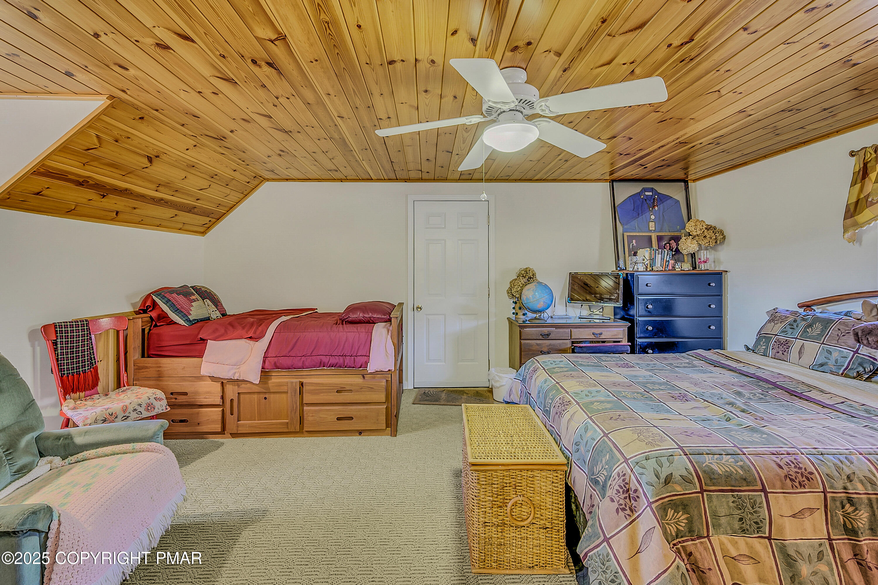 1451 Long Pond Road Long Pond, PA 18334 - Photo 58 of 82 a bedroom with a bed and a chandelier